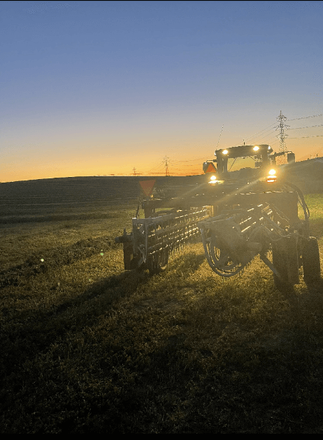 farm machinery at sunset